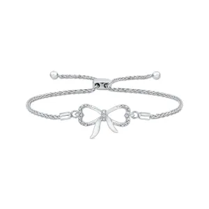 KATARINA Bow and Heart Shaped Infinity Diamond Tennis Bracelet (1/20 cttw)